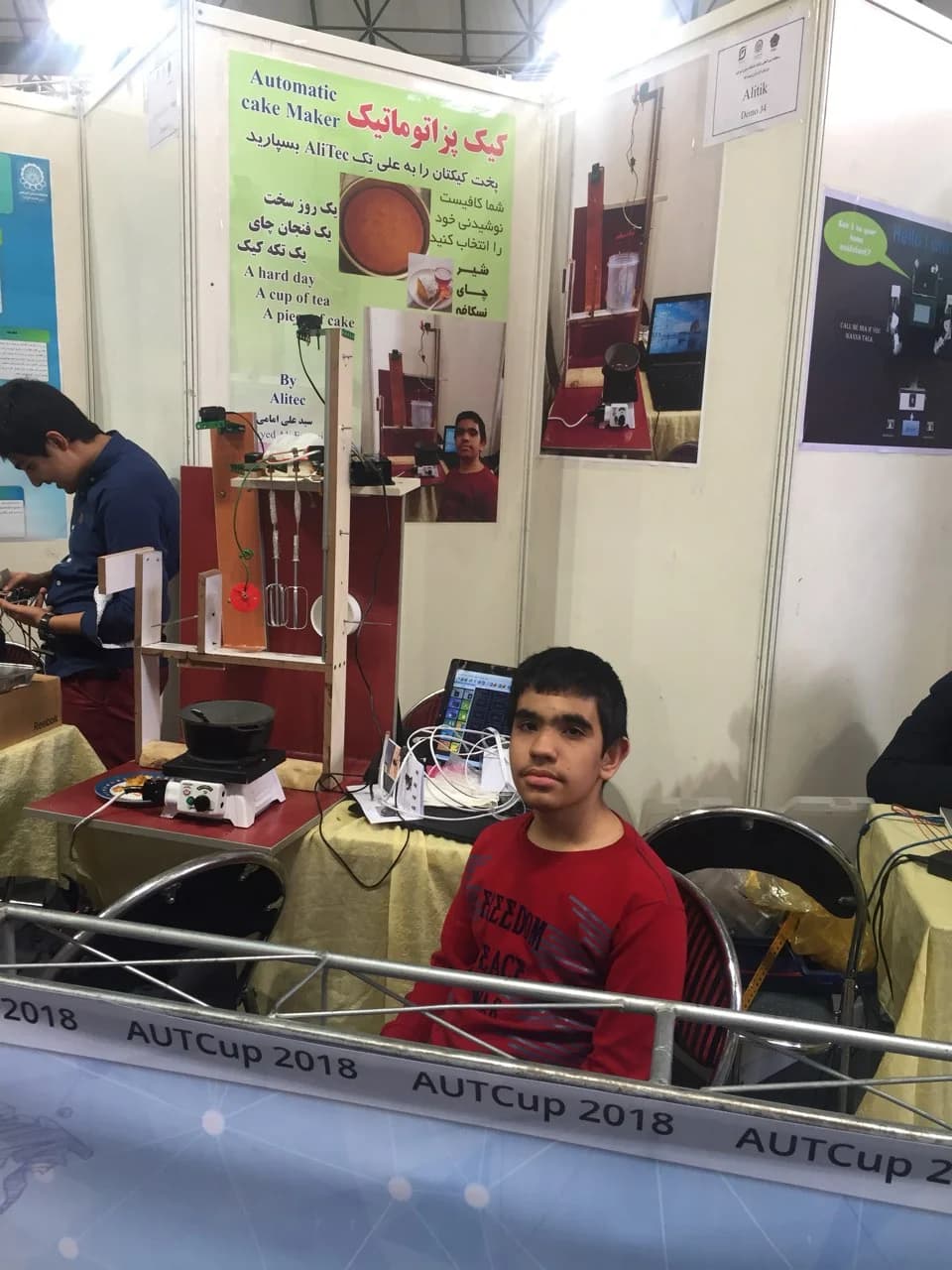 Ali at an early robotics event