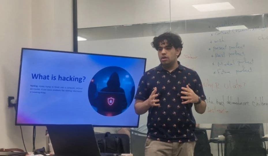 Ali giving a short talk about hacking