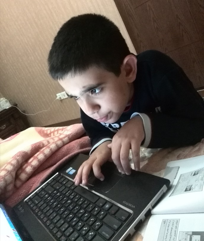 SeyedAli Emami coding as a child