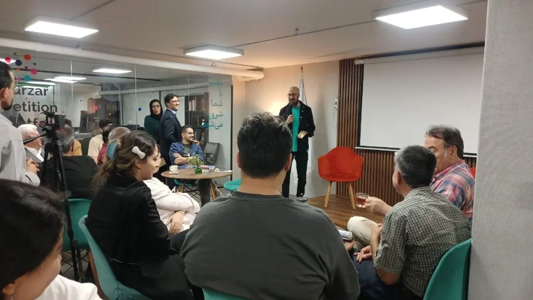 The Karzar internet meeting with participants gathered around the speakers