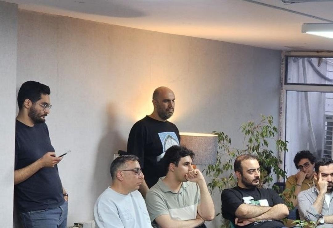 A speaker addressing participants at the Karzar internet meeting